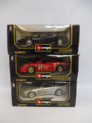 Three boxed Burago 1/18 scale models, all Ferraris of different eras.