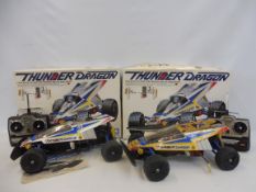 A boxed Tamiya Thunder Dragon 1/10th scale high performance 4WD off-road racer, model kit, plus