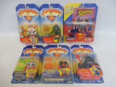 Five Kenner Superman carded figure and action sets, generally good condition.