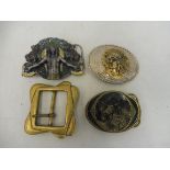 Two detailed Bergamot buckles, and two others, three with native American and horse designs.