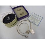 A cased pair of Girona silver dolphin earings plus a silver Christening bracelet, a cased Links