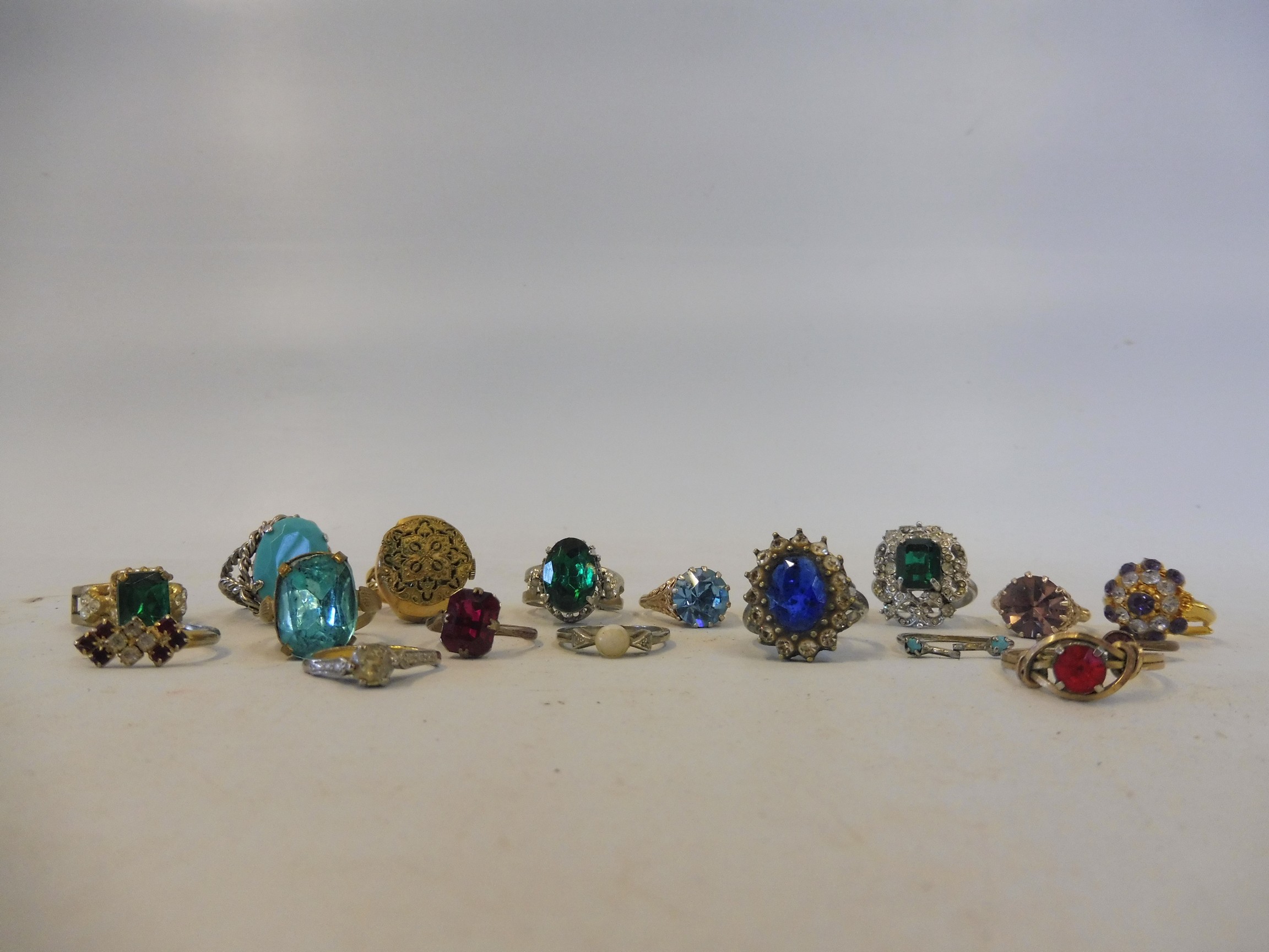 A tray of asorted dress rings.