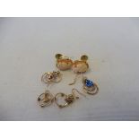 A pair of 9ct gold and cameo inset earings, plus two further pairs of yellow metal earings.