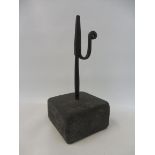 An early 19th Century primitive rushlight holder on a painted base, 8 1/2" h.