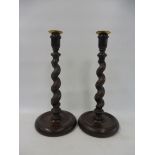 A pair of oak barley twist candlesticks with brass sconces, 12 1/2" h.