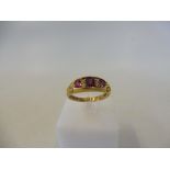 A cased 18ct gold ruby and diamond ring, Chester 1898, size P/Q, 4.9g.