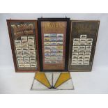 A stained glass panel, 16 3/4 x 10", plus three framed and glazed reproduction sets of cigarette