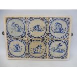 A group of six 17th Century (1650-1680) Delft blue and white tiles, all depicting animals, includin