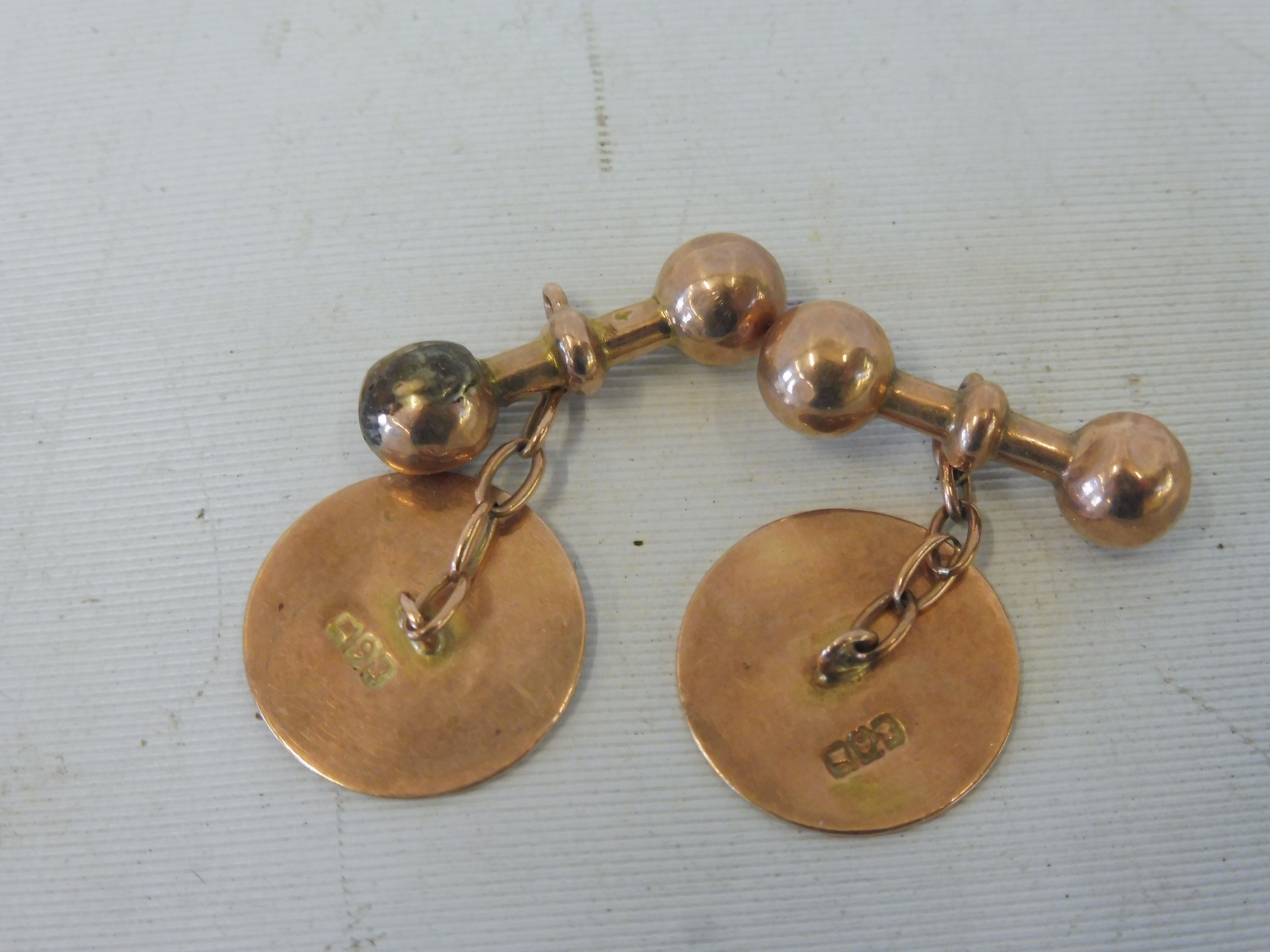 A pair of 9ct gold and enamel cufflinks, with a coat of arms flanked by a kangaroo and an emu or - Image 2 of 2