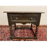 A primitive 17th Century Welsh oak side table with bobbin suports, 30 1/2" w x 26" h x 23" d.