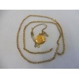 A 9ct gold chain plus a 9ct gold medallion on chain, combined 8.4g.