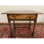 An early 18th Century figured oak and oak side table with drawer, 34 1/2" w x 28" h x 20 3/4" d.