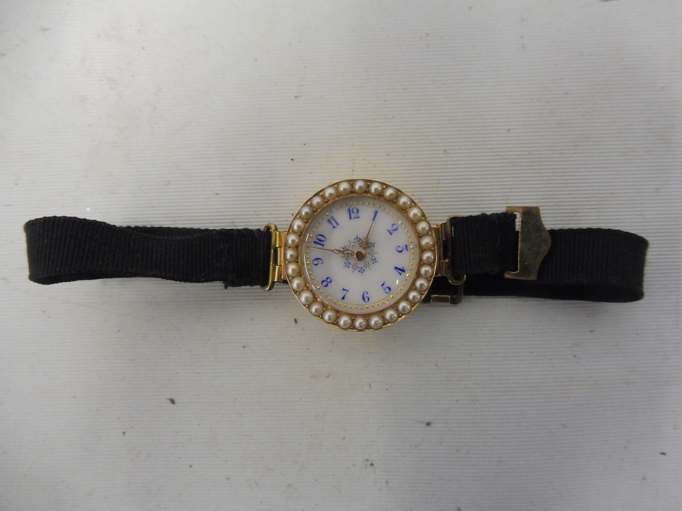 A high quality yellow metal, probably at least 15ct gold ladies wristwatch, the circular white - Image 2 of 4