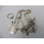 A silver ring, several silver chains, a contemporary pendant etc.