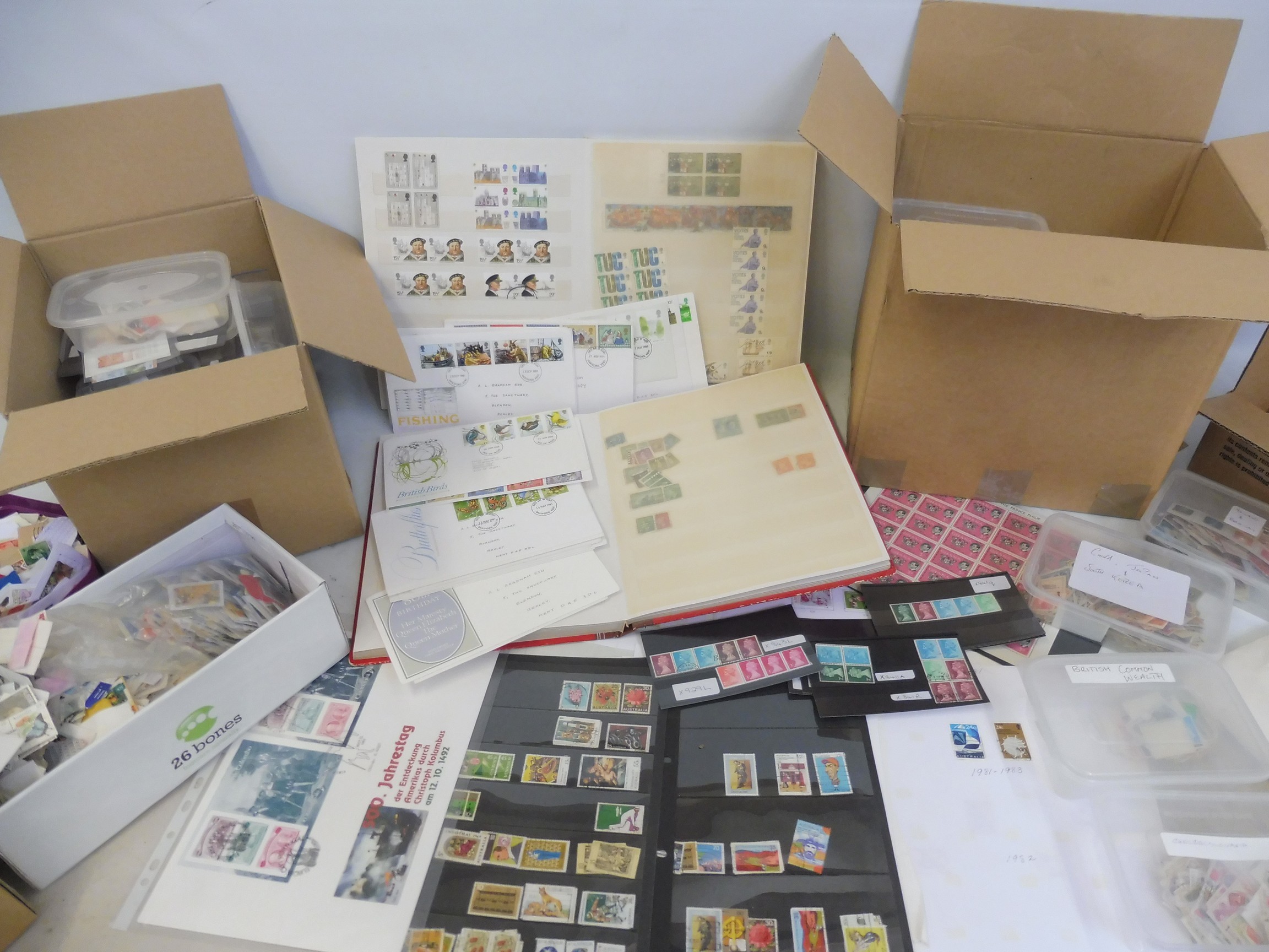 A quantity of loose stamps, GB block sets, stock albums etc.