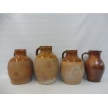 Three 19th Century Welsh pottery jugs and one other.