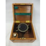 A wooden cased nephoscope, by Negretti & Zambra of London.