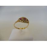 A cased 18ct gold Edwardian ruby and diamond ring, Birmingham 1905, size P/Q, 2.6g.