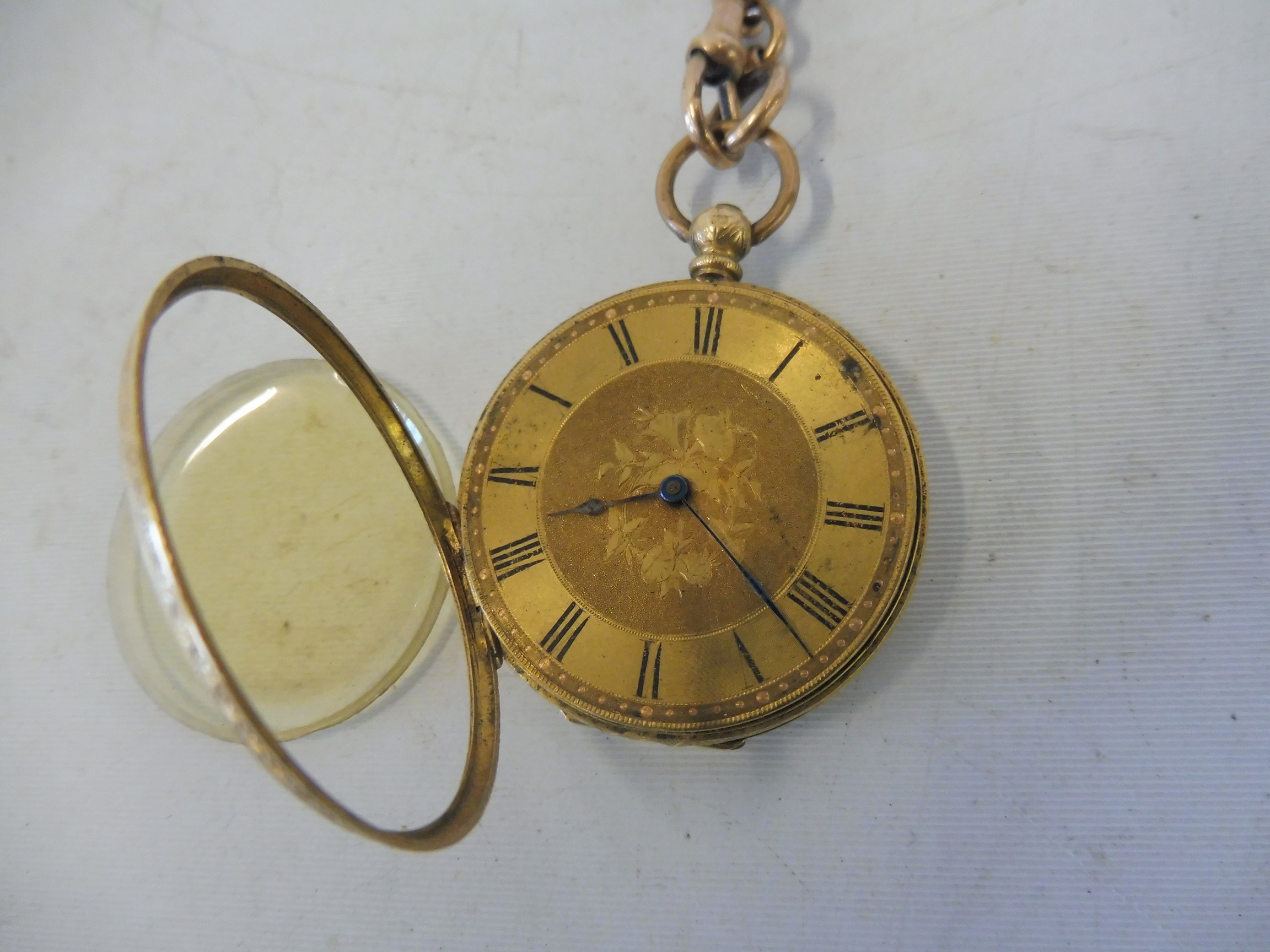 A yellow metal pocket watch marked K18, the movement engraved Joseph & Fils Geneve, approx. 40g,