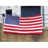 An American stars and stripes flag, label to spine, 118 x 69".