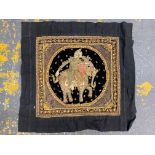 An Eastern sequin and thread embroidered panel depicting a figure on an elephant, 26 x 24 3/4".