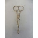 A pair of silver sugar scissors, marks indistinct.