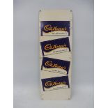 A Cadbury's Dairy Milk Chocolate narrow tin advertising sign, 5 x 14 1/2".