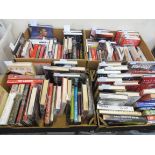 An extensive collection in four boxes of Manchester United books, 44 signed including Norman