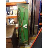 A framed dioramah of two polo mallets, an HMS Bristol shield and three balls, 61" w x 16" h x 4 1/2"