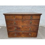 An 18th Century oak chest of two short over three long drawers, 42" w x 32" h x 25" d.