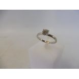A diamond solitaire ring, set in platinum, with a round brilliant cut stone, 0.46 carat (according