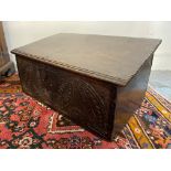 A 17th Century carved oak desk box with love token paper lining, 21" w x 11" h x 13" d.
