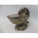 A good quality silver plated table sugar holder in the form of a shell, decorated with a dolphin