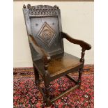 A Charles II oak panelled Wainscot armchair, 42 1/2" h.