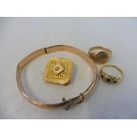 A 9ct gold bangle, a 9ct gold signet ring, a good quality gold square brooch, 14.8g and an 18ct gold