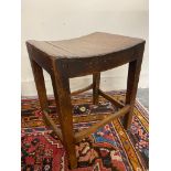 A Georgian country elm stool with dished seat, 14" w x 18" h x 11" d.