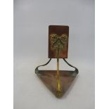 An Art Nouveau copper and brass embellished matchbox holder, 4 1/4" h.