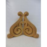 A pair of carved wooden corbels, each 11 x 17 1/2".