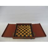 A good quality 19th Century mahogany cased travelling chess set, the box when closed measures 12"