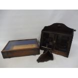 A small mahogany wall hanging cabinet, plus a small corner bracket and an oak smoking cabinet.