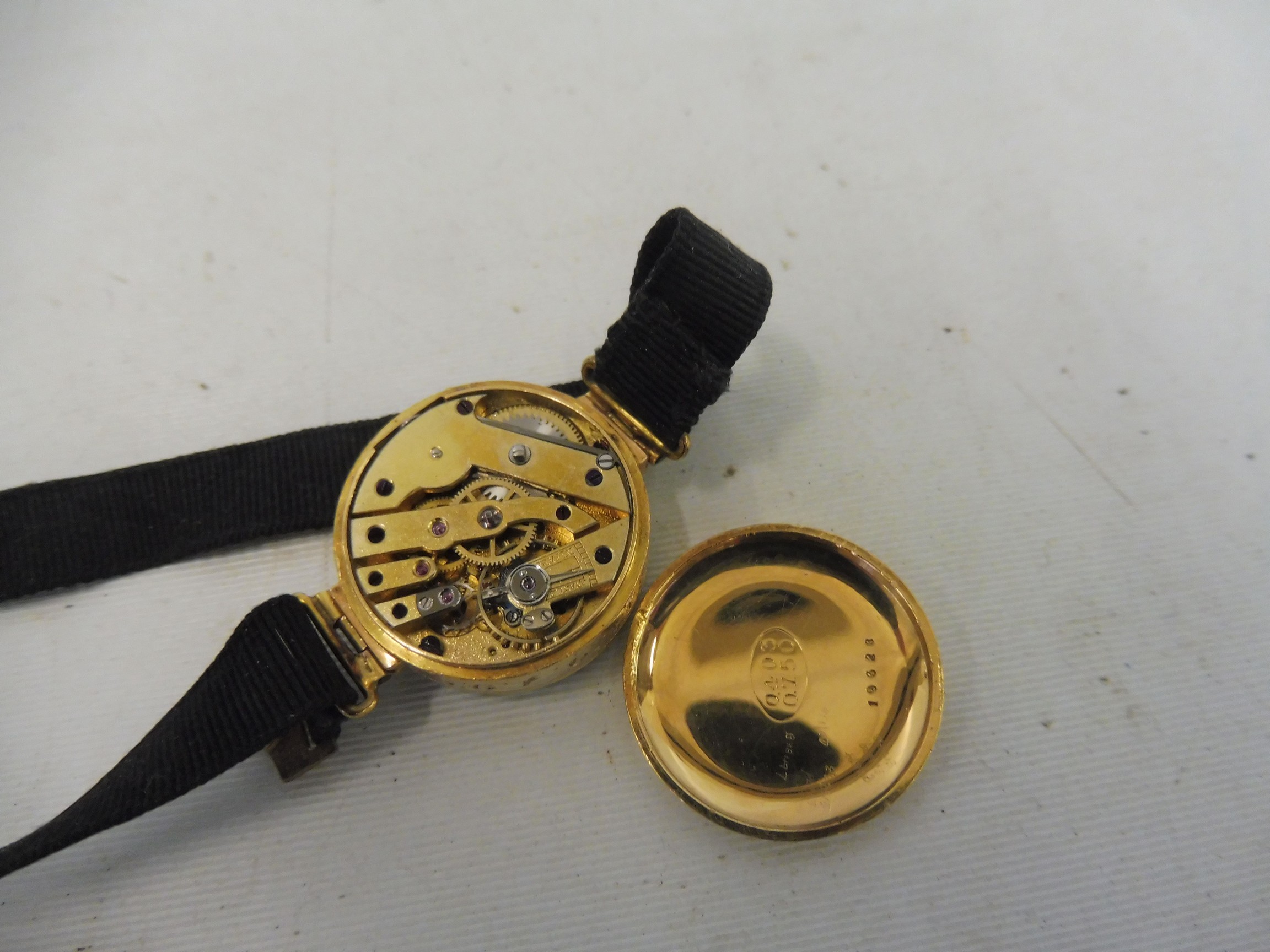 A high quality yellow metal, probably at least 15ct gold ladies wristwatch, the circular white - Image 4 of 4