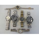 Six assorted wristwatches including three reproduction gents Rolex etc.