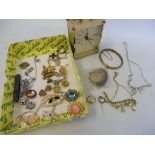 A collection of assorted costume jewellery including a silver stick pin etc.