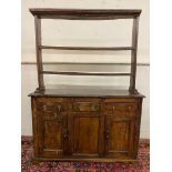 An 18th Century West Country elm cottage dresser with open plate rack, 49 1/2" w x 69" h x 13 1/2"