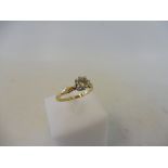 An 18ct gold diamond solitaire ring, size L, 2.3g.