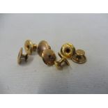 Three 18ct gold studs, 2.2g and four 9ct gold studs, 2.3g.