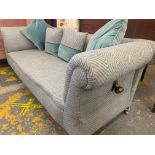 A Victorian drop end Chesterfield settee with blue upholstery and matching cushions, approx. 81" w.