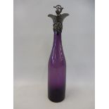 An amethyst coloured glass decanter with silver mount, 11 3/4" h.