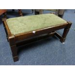 A vintage oak rectangular Stool, the drop in seat with green foliate upholstery, 28in (71cm) x 14½in