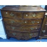 A Victorian walnut bow front Chest of Drawers, two short drawers over three graduated long